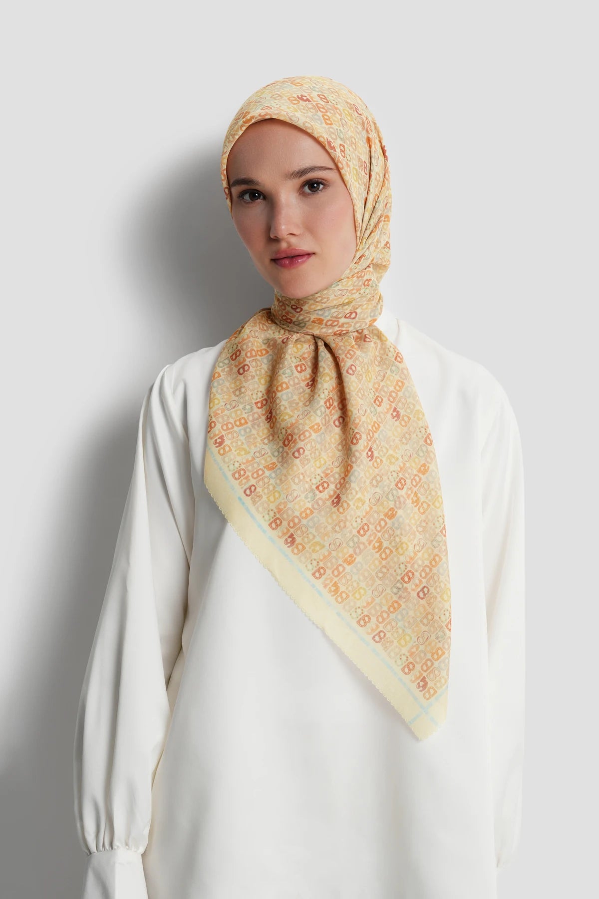 nagita square scarf in butter by buttonscarves front view