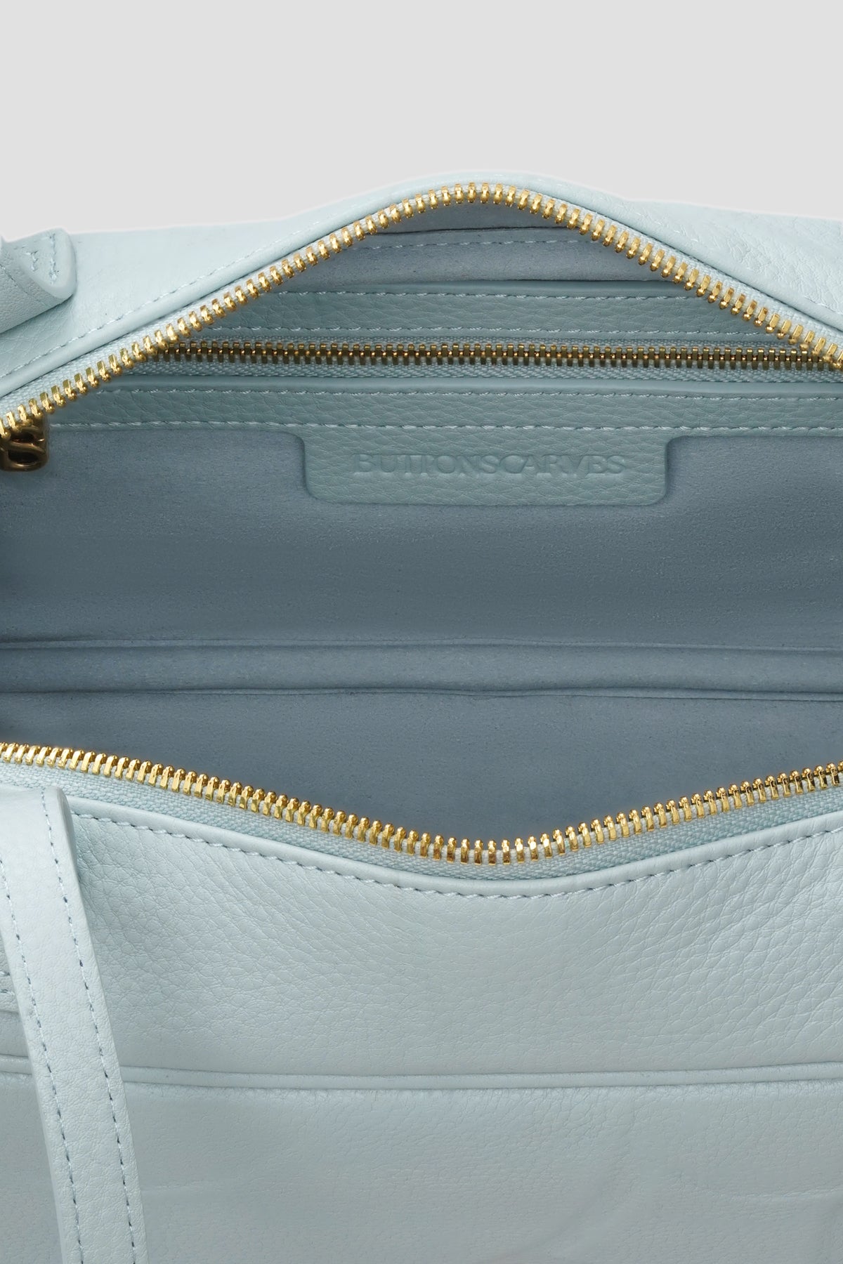 bria shoulder bag in baby blue by buttonscarves interior
