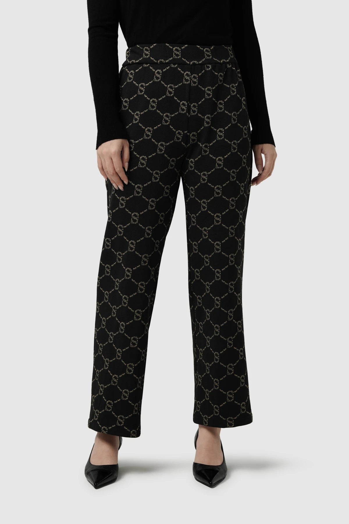 beverly monogram pants in black by buttonscarves front view