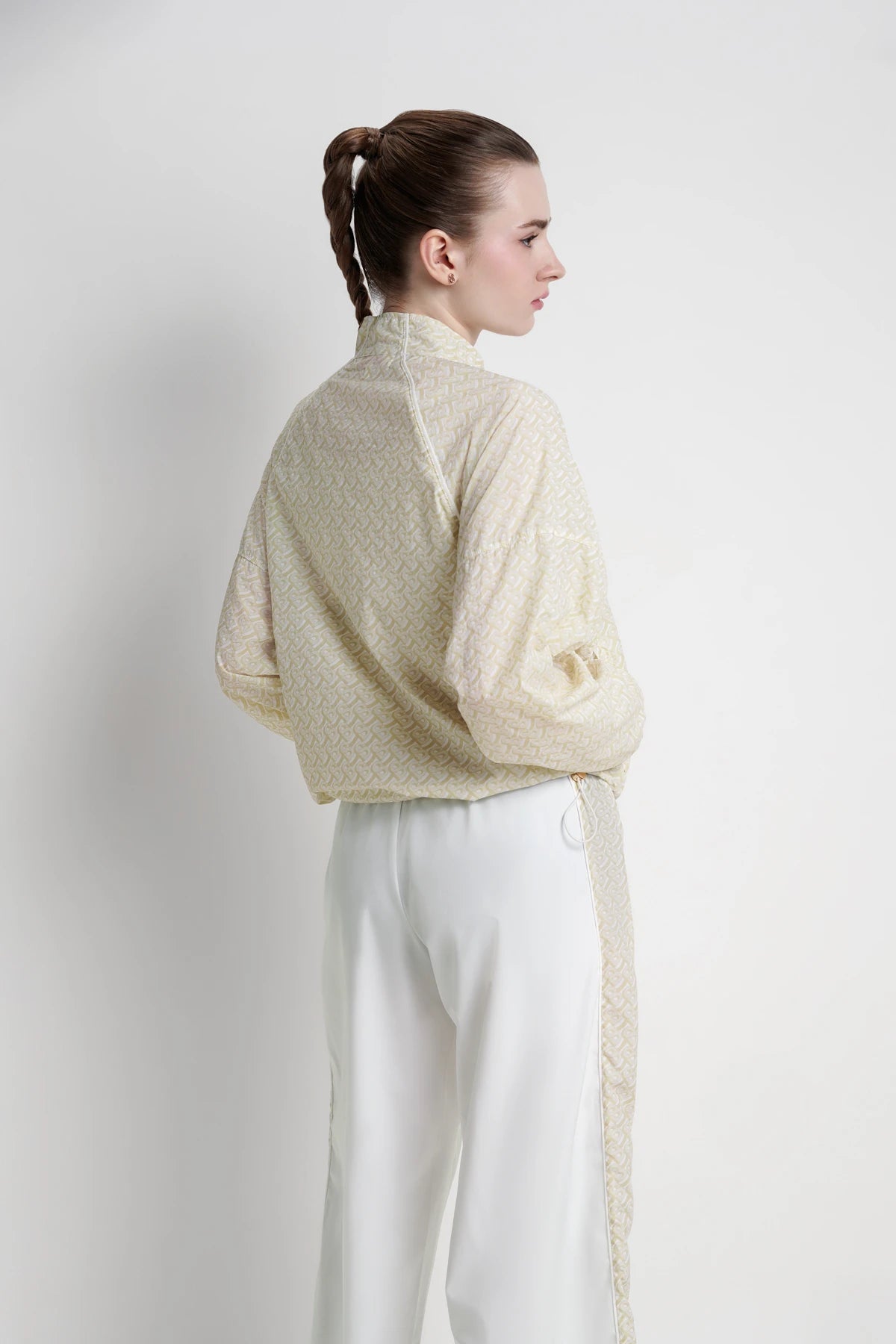 bimu windbreaker jacket in vanilla by buttonscarves back view