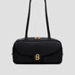 bria shoulder bag in black by buttonscarves front view