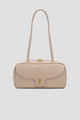 bria shoulder bag in clay by buttonscarves front view