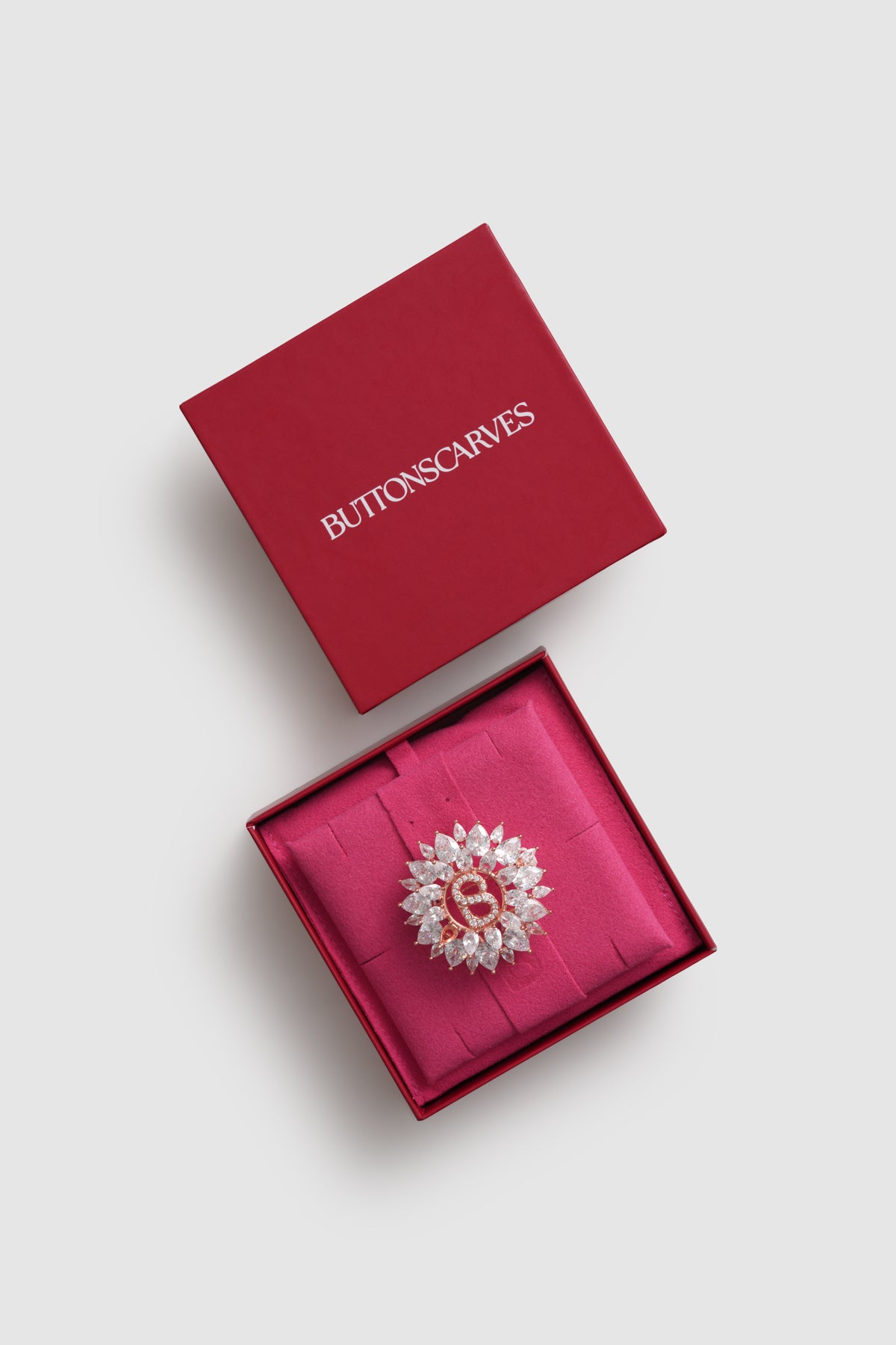 raina brooch in rose gold by buttonscarves