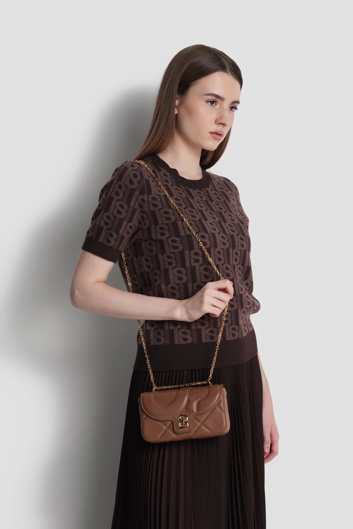alana small bag in brown by buttonscarves carried as sling bag