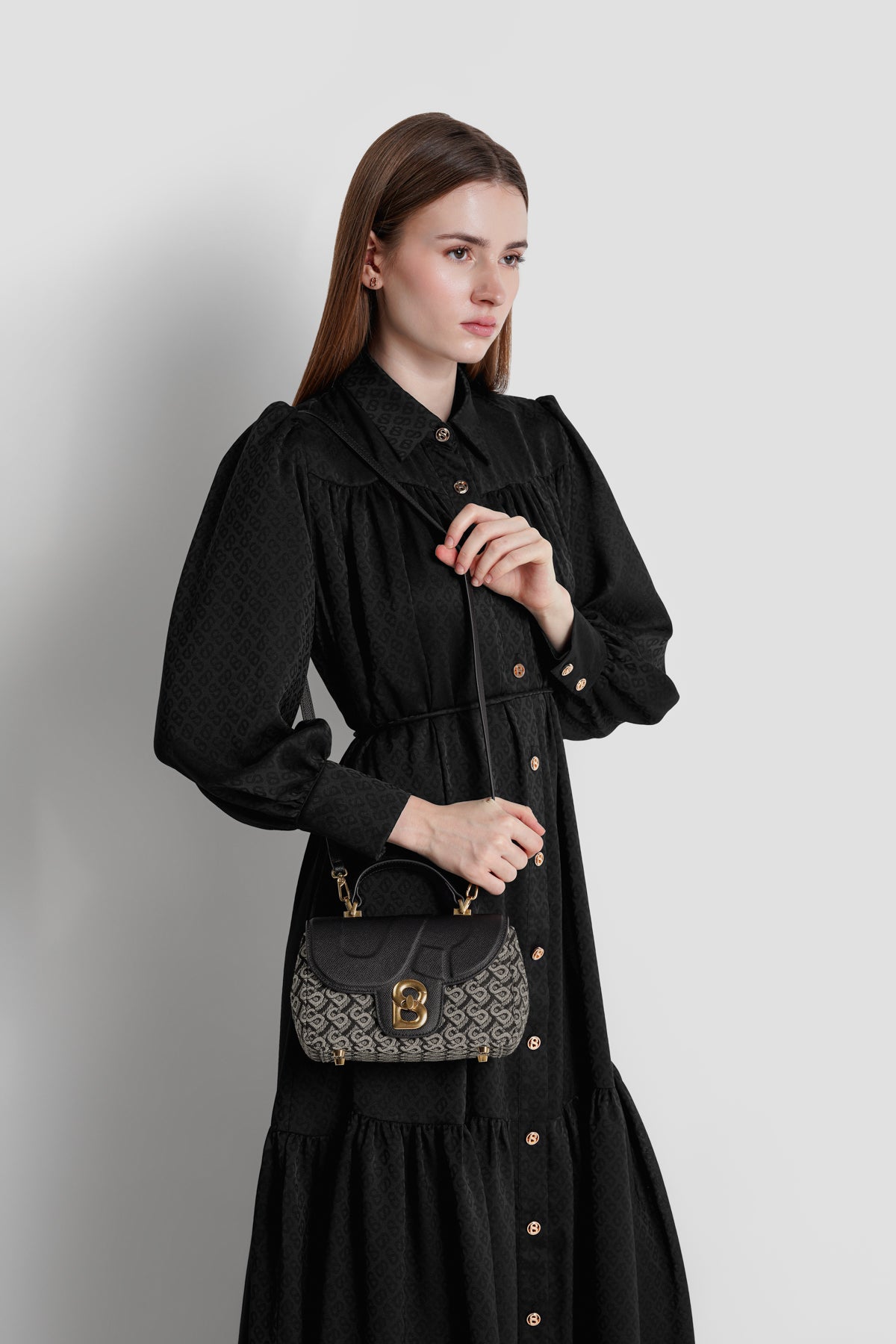 alma bimu jacquard sling bag small in black by buttonscarves carried as sling bag