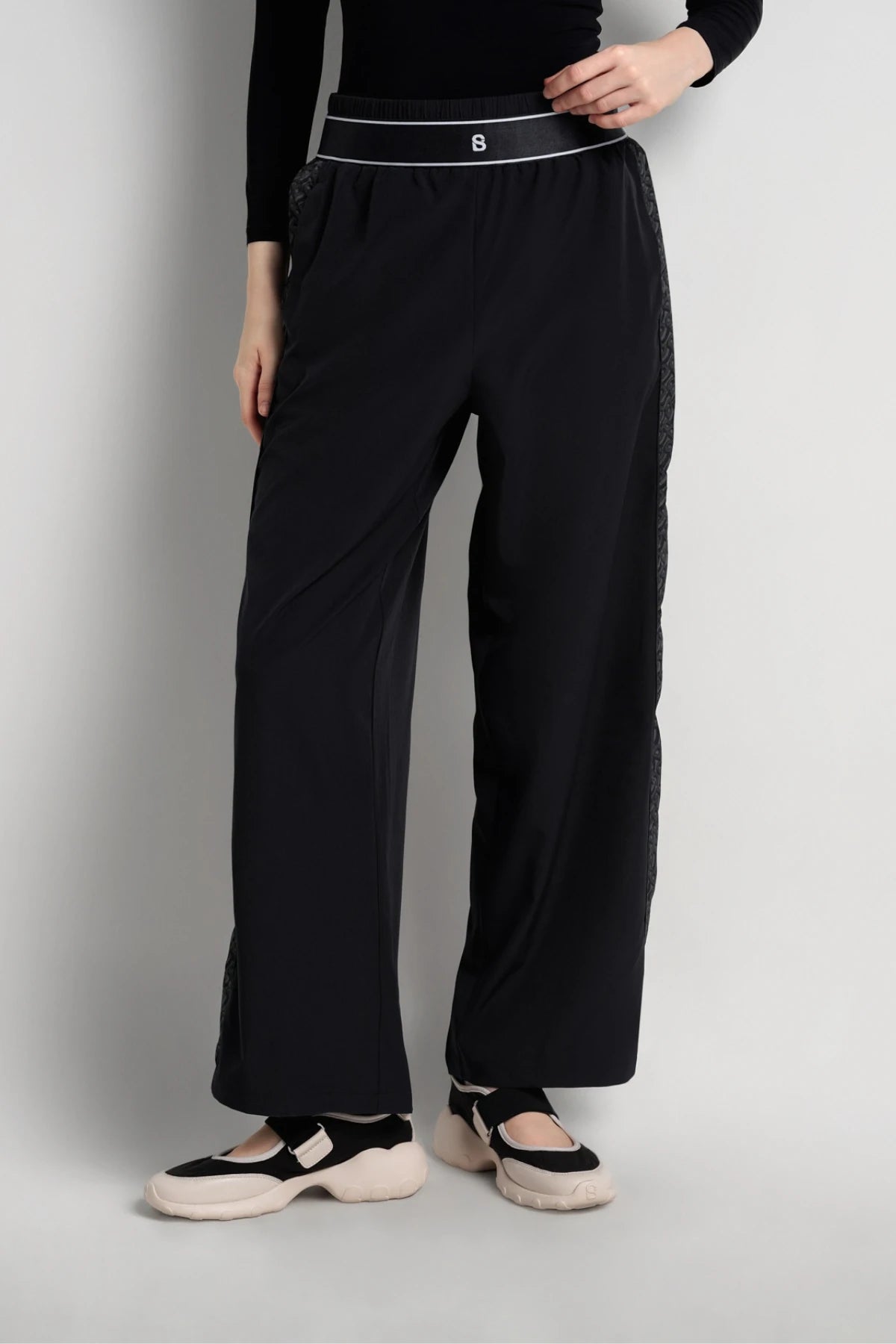 bimu pants in black by buttonscarves front view