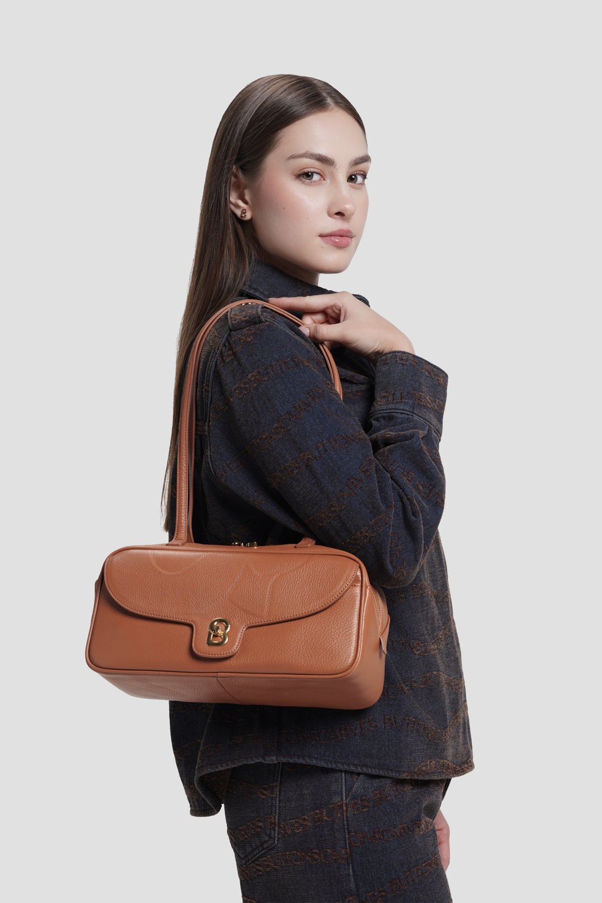 bria shoulder bag in caramel by buttonscarves carried on shoulder