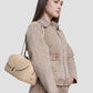 bria shoulder bag in clay by buttonscarves carried on shoulder