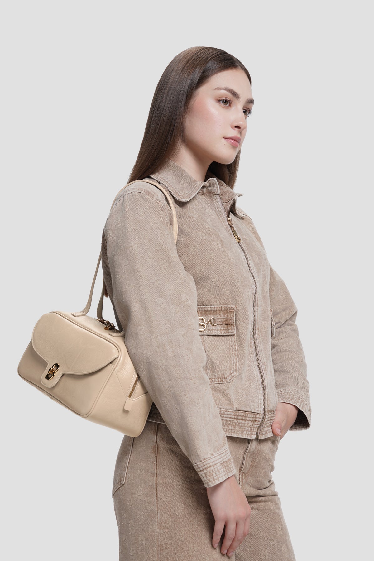 bria shoulder bag in clay by buttonscarves carried on shoulder