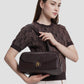 bria shoulder bag in dark brown by buttonscarves carried on shoulder