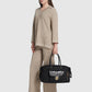 nara carryal bag in black by buttonscarves hand carried style