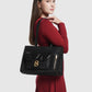 nara tote bag in black by buttonscarves carried on shoulder