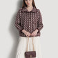 alana small bag in burgundy by buttonscarves carried by hand