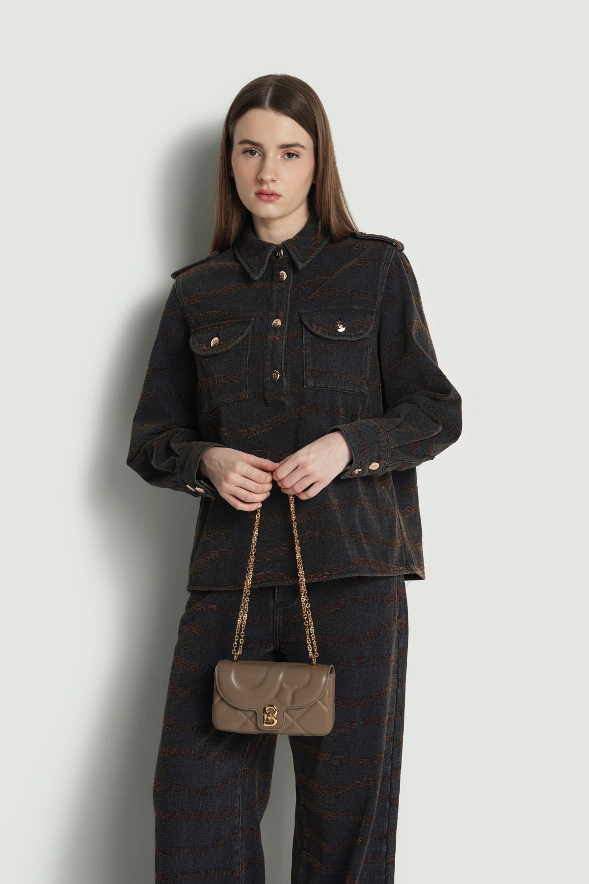 alana small bag in taupe by buttonscarves carried by hand