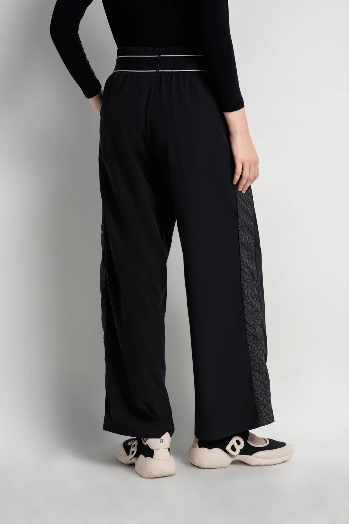 bimu pants in black by buttonscarves back view