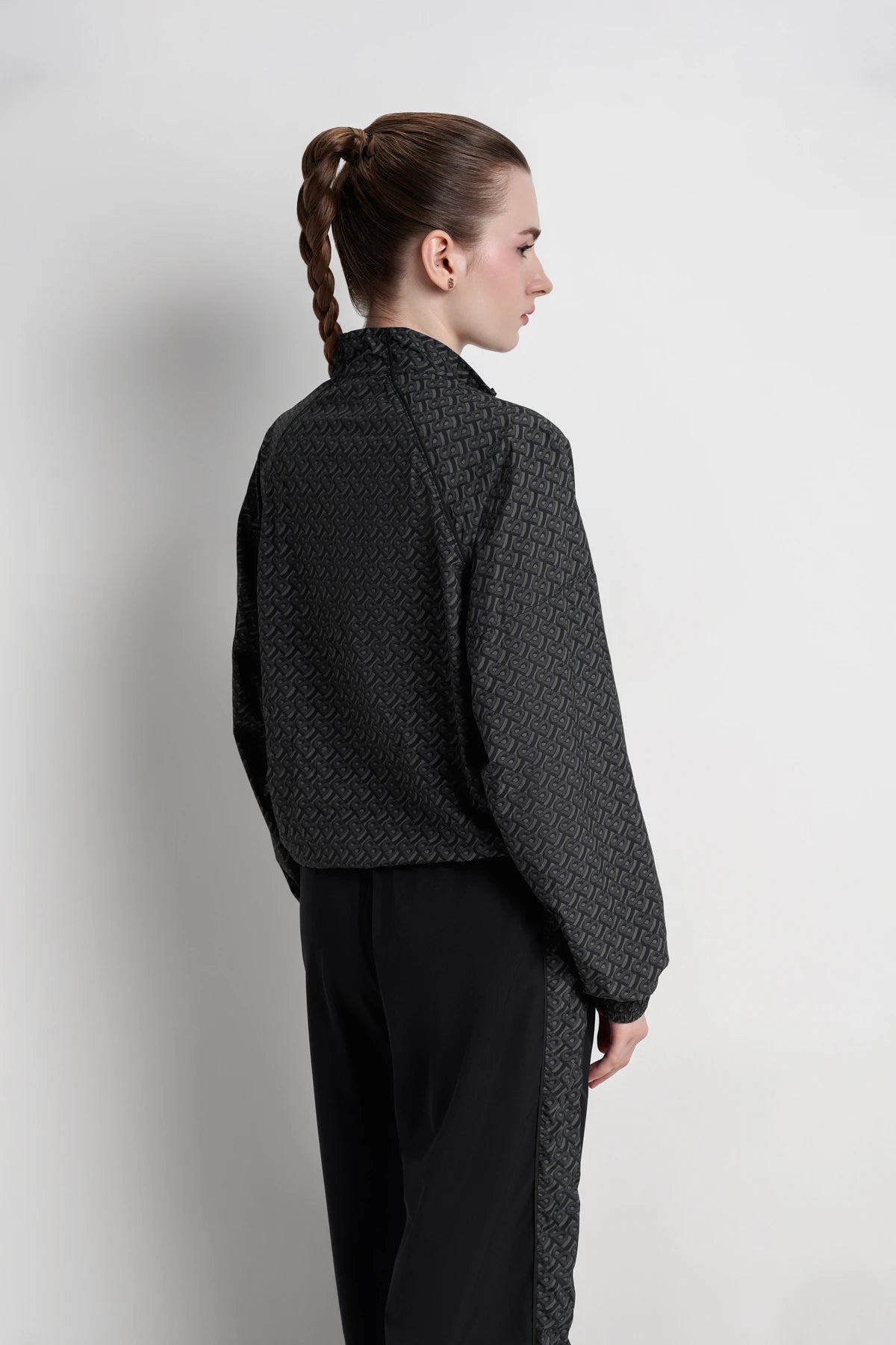 bimu windbreaker jacket in black by buttonscarves back view