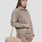 bria shoulder bag in clay by buttonscarves carried on wrist