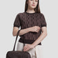 bria shoulder bag in dark brown by buttonscarves carried on wrist