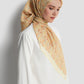 nagita square scarf in butter by buttonscarves side view