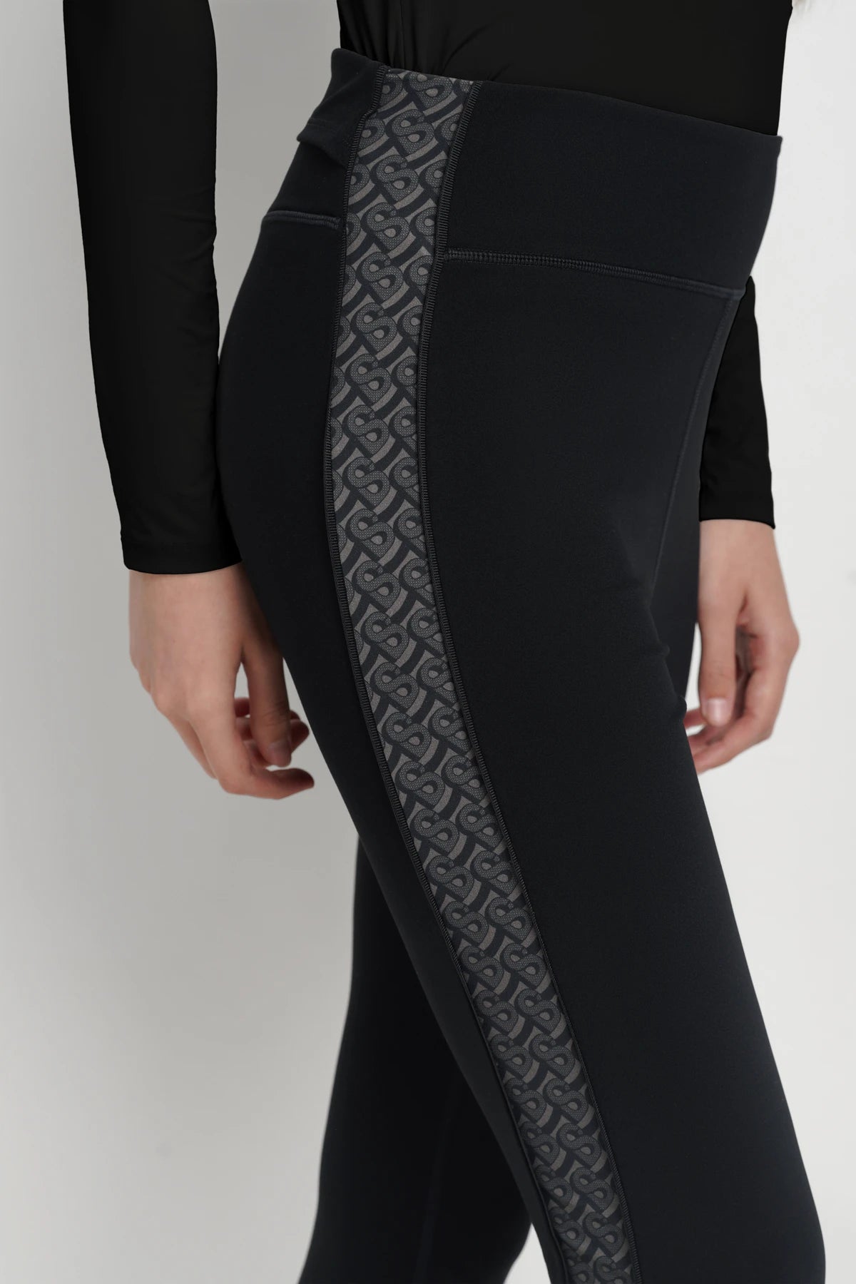 bimu legging in black by buttonscarves signature bimu monogram pattern detail