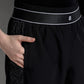 bimu pants in black by buttonscarves with side pockets