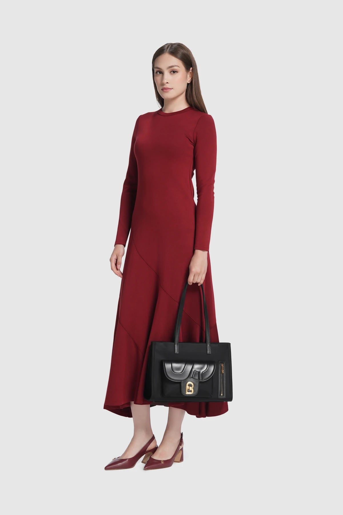 nara tote bag in black by buttonscarves carried by hand style