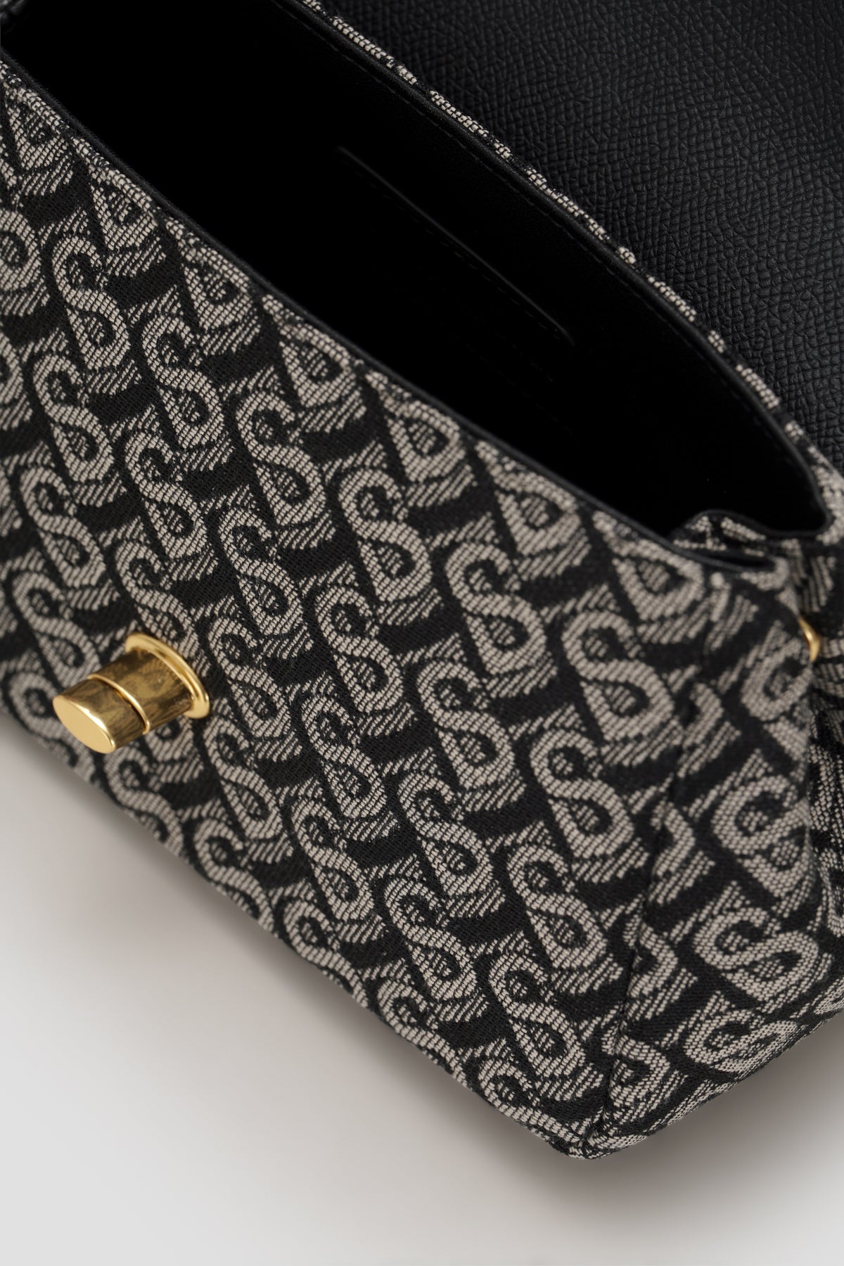alma bimu jacquard sling bag small in black by buttonscarves pattern detail