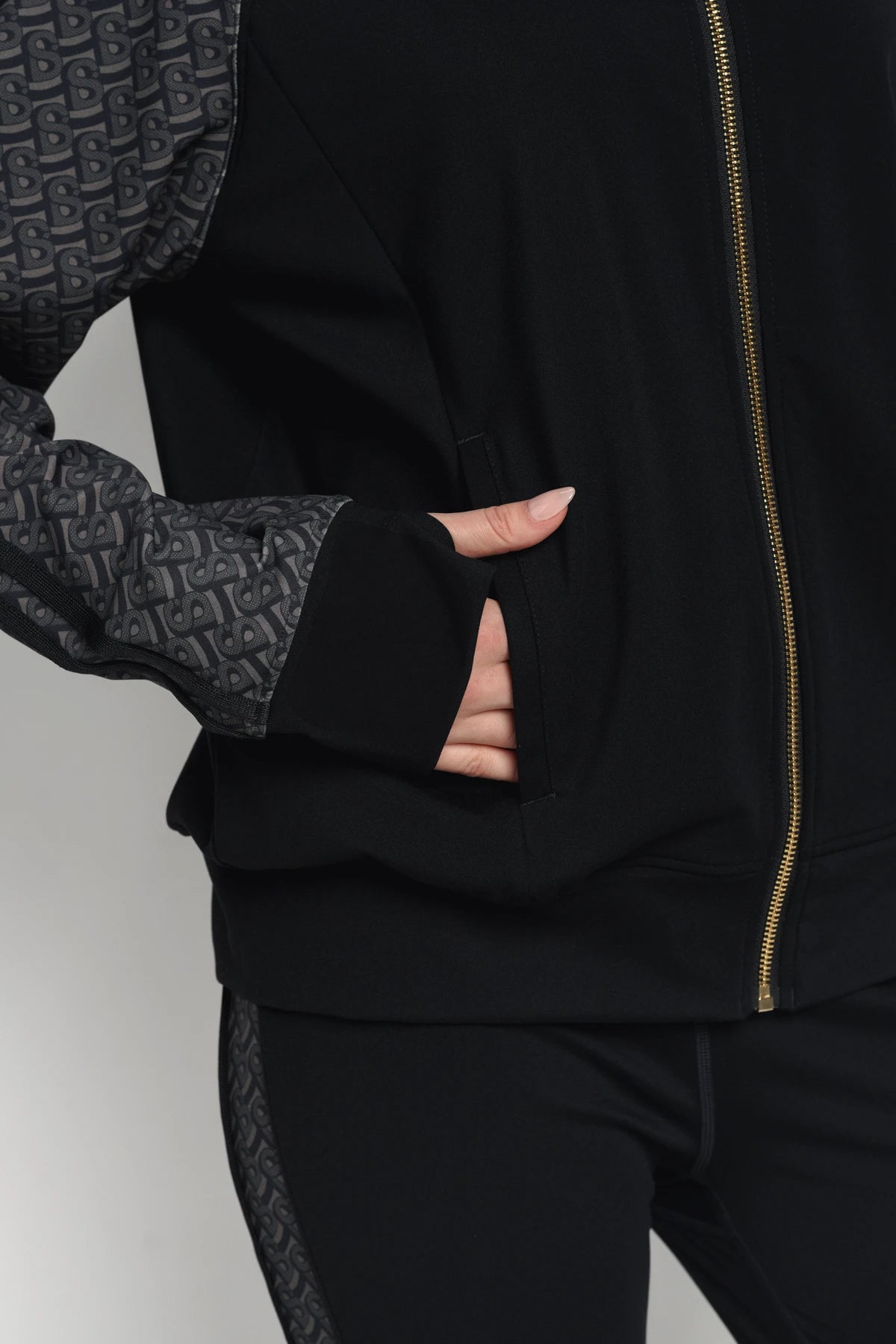 bimu shield jacket in black by buttonscarves front pockets detail