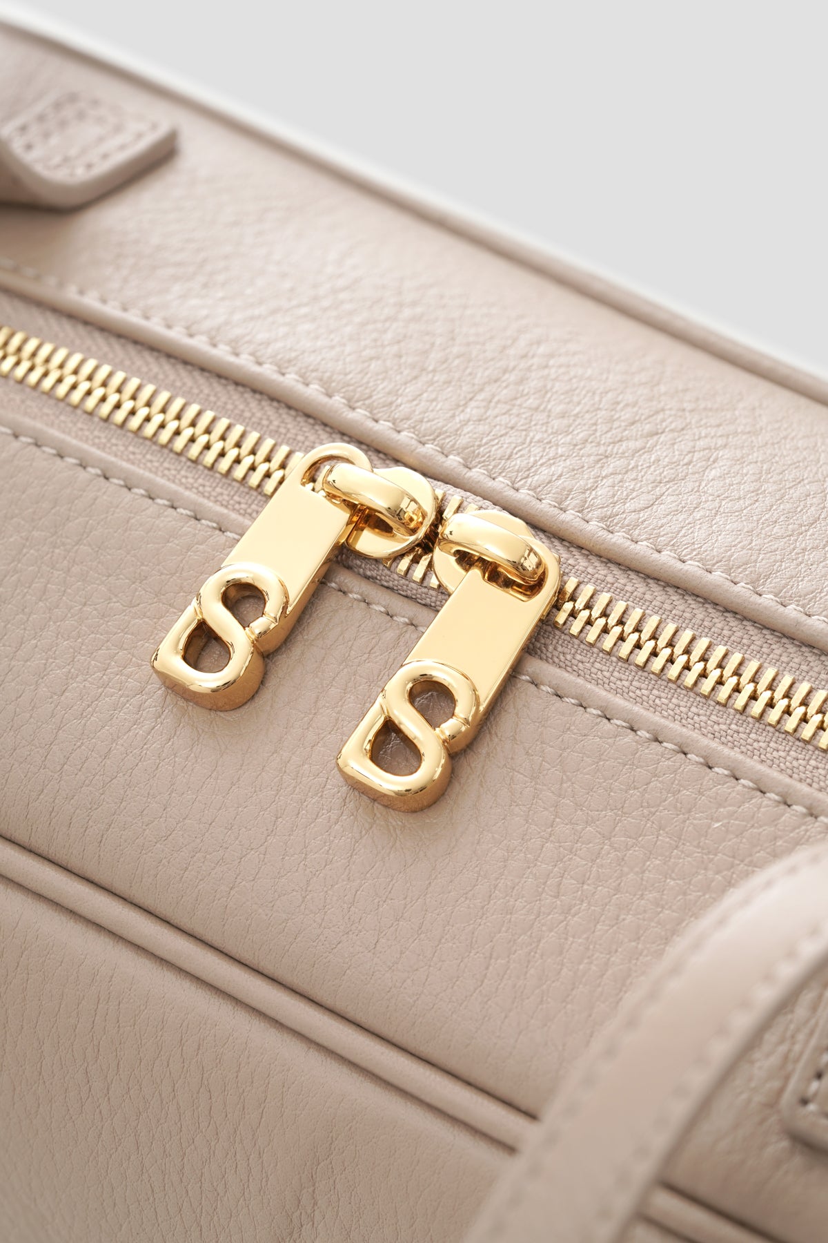 bria shoulder bag in clay by buttonscarves secure top zipper detail