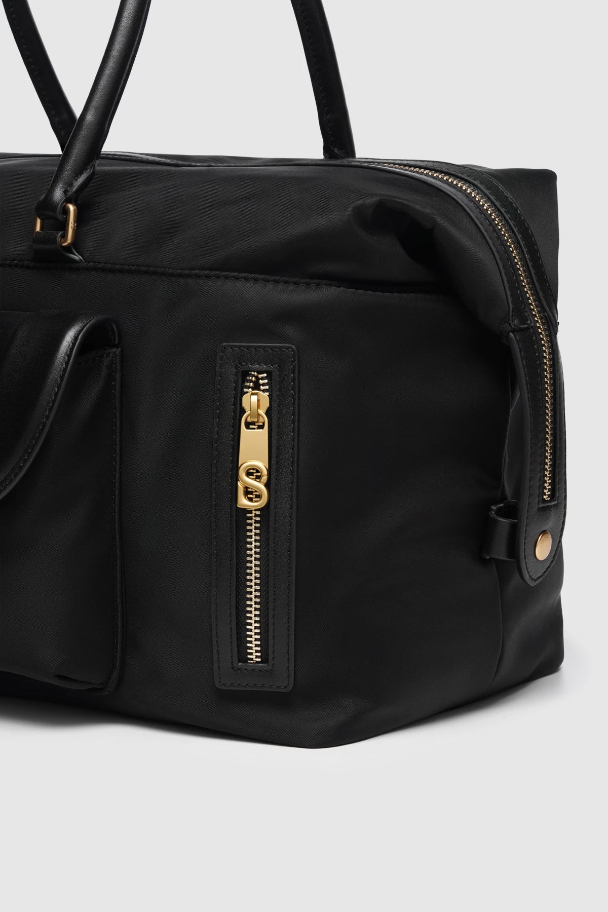 nara carryal bag in black by buttonscarves front zippet pocket detail