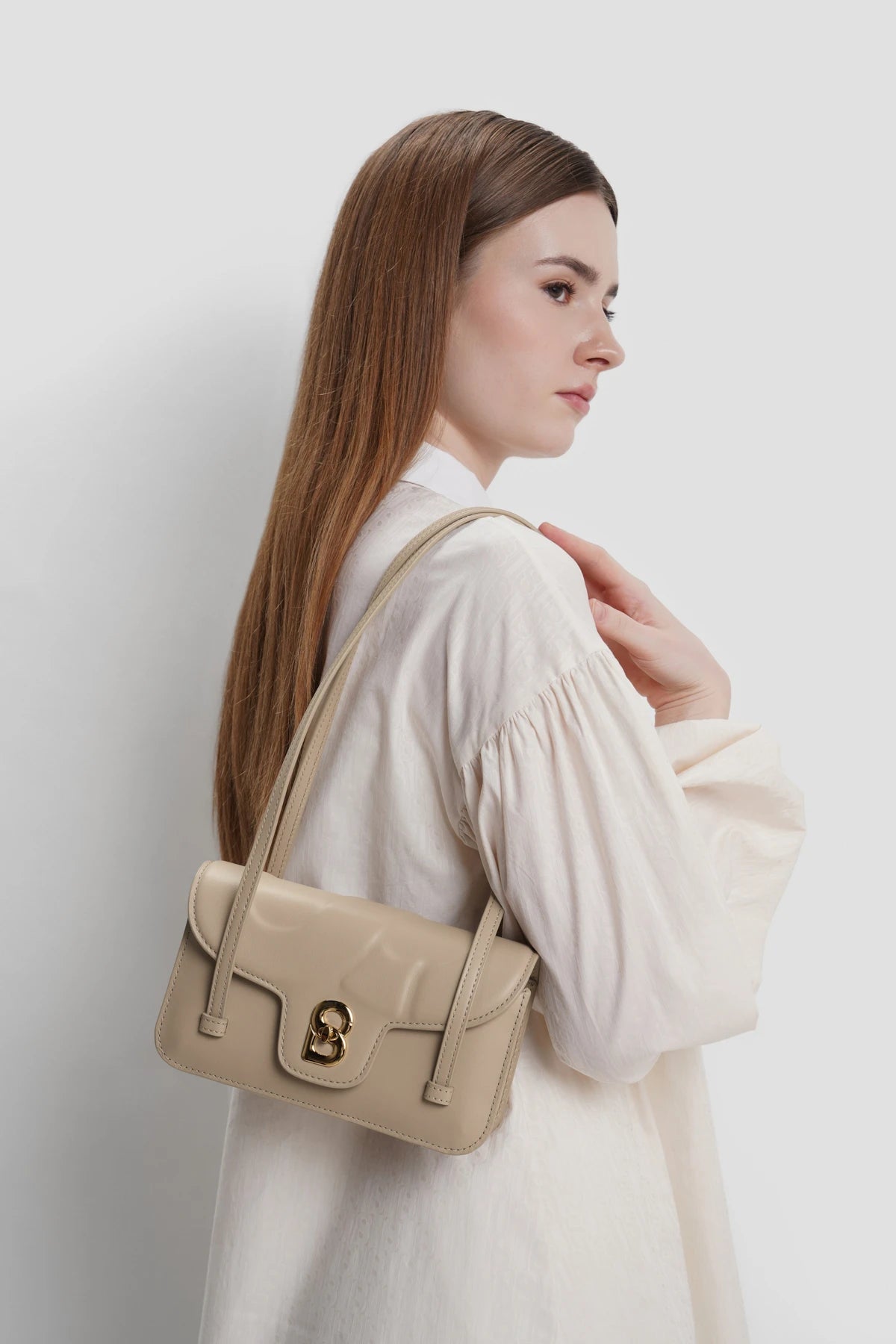 alka shoulder bag in cocoon by buttonscarves carried on shoulder