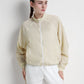 bimu windbreaker jacket in vanilla by buttonscarves front view