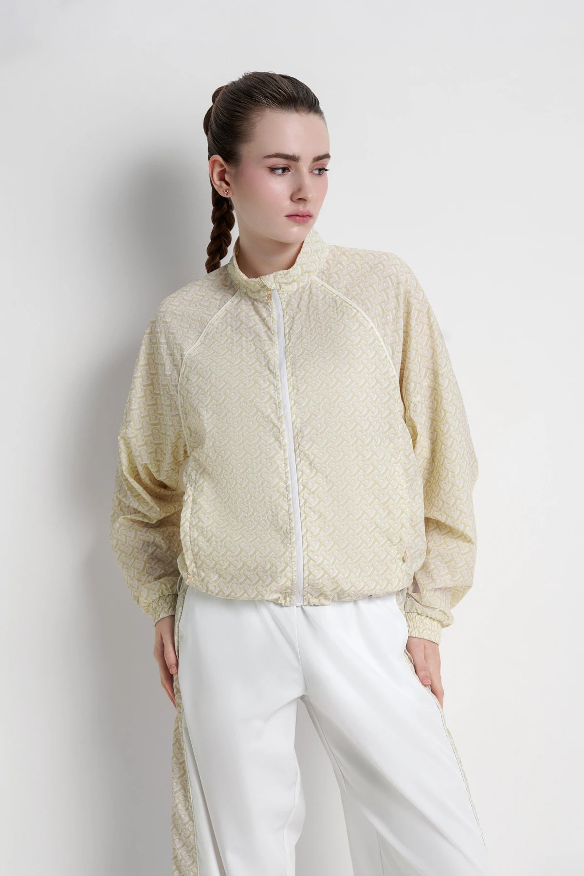 bimu windbreaker jacket in vanilla by buttonscarves front view
