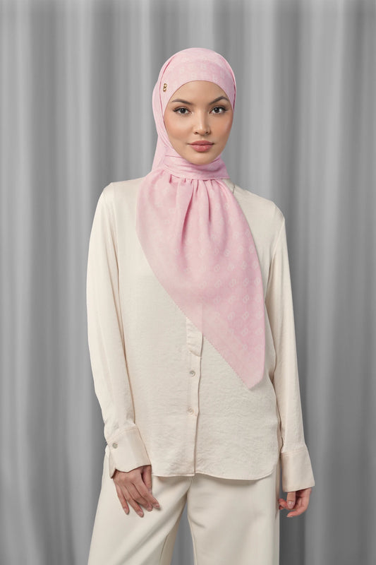 pink beach square scarf by buttonscarves styled in a modern hijab look