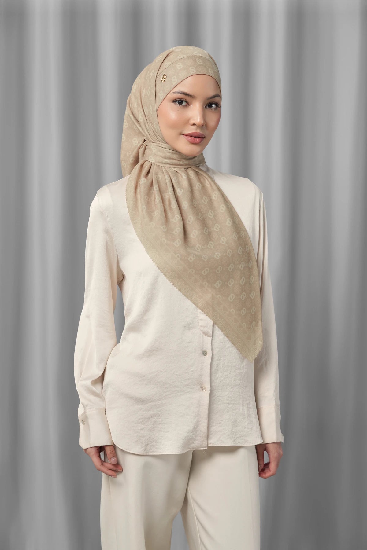 sand square scarf by buttonscarves styled in a modern hijab look