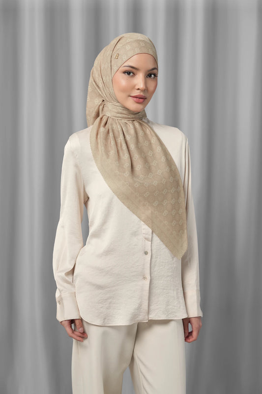 sand square scarf by buttonscarves styled in a modern hijab look